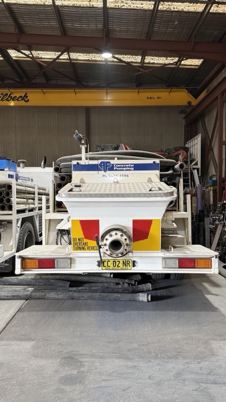 The hopper at the back of an A.F. line pump
