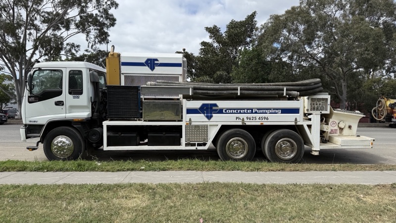 A.F. Concrete Pumping line pump truck in a suburban street