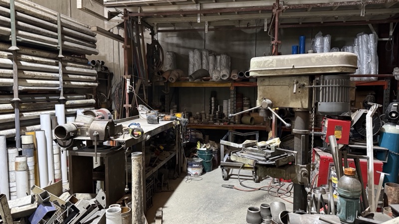 The workbench and lathe in the Glendenning workshop